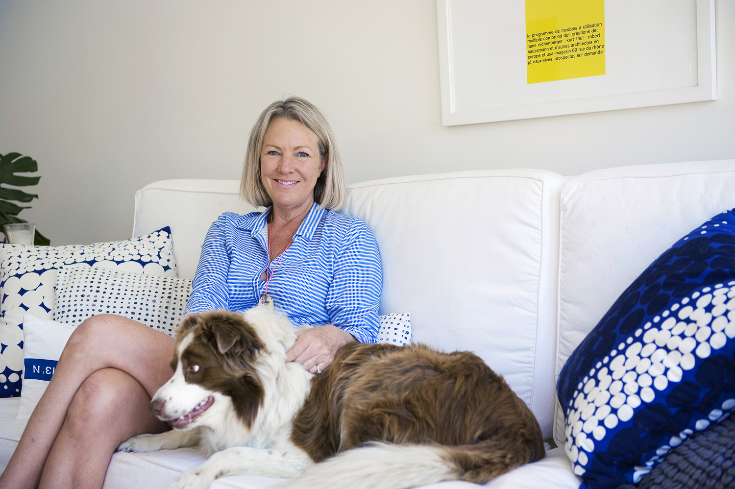 Flight attendant Susie at home with her dog