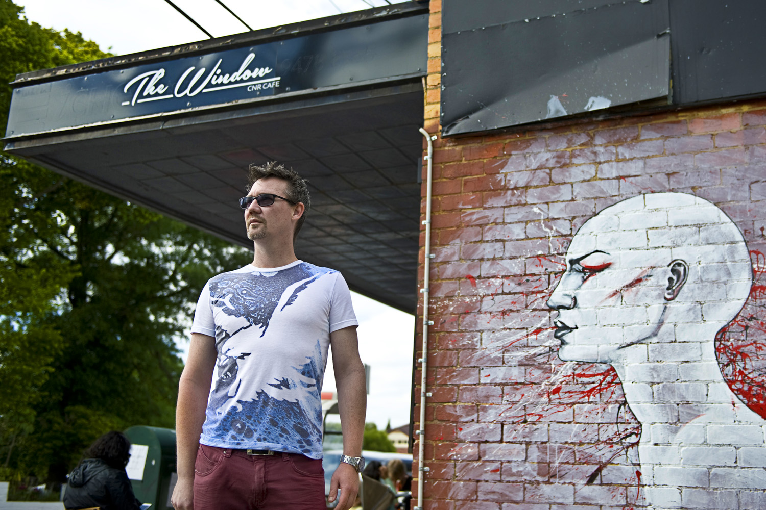 chef sunny gilbert outside his cafe the window corner cafe