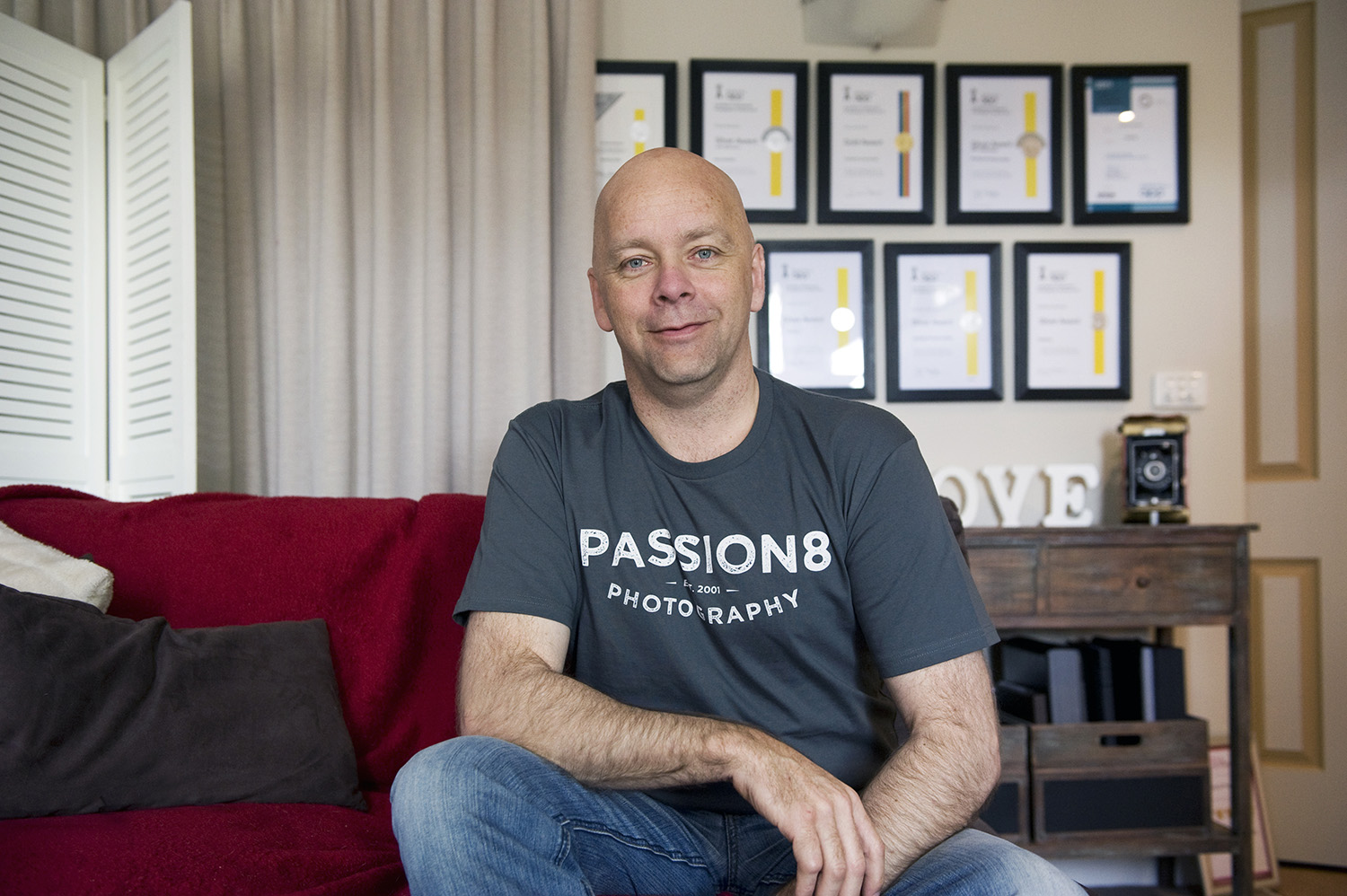 Wedding Photographer Andrew Harrison in his home studio