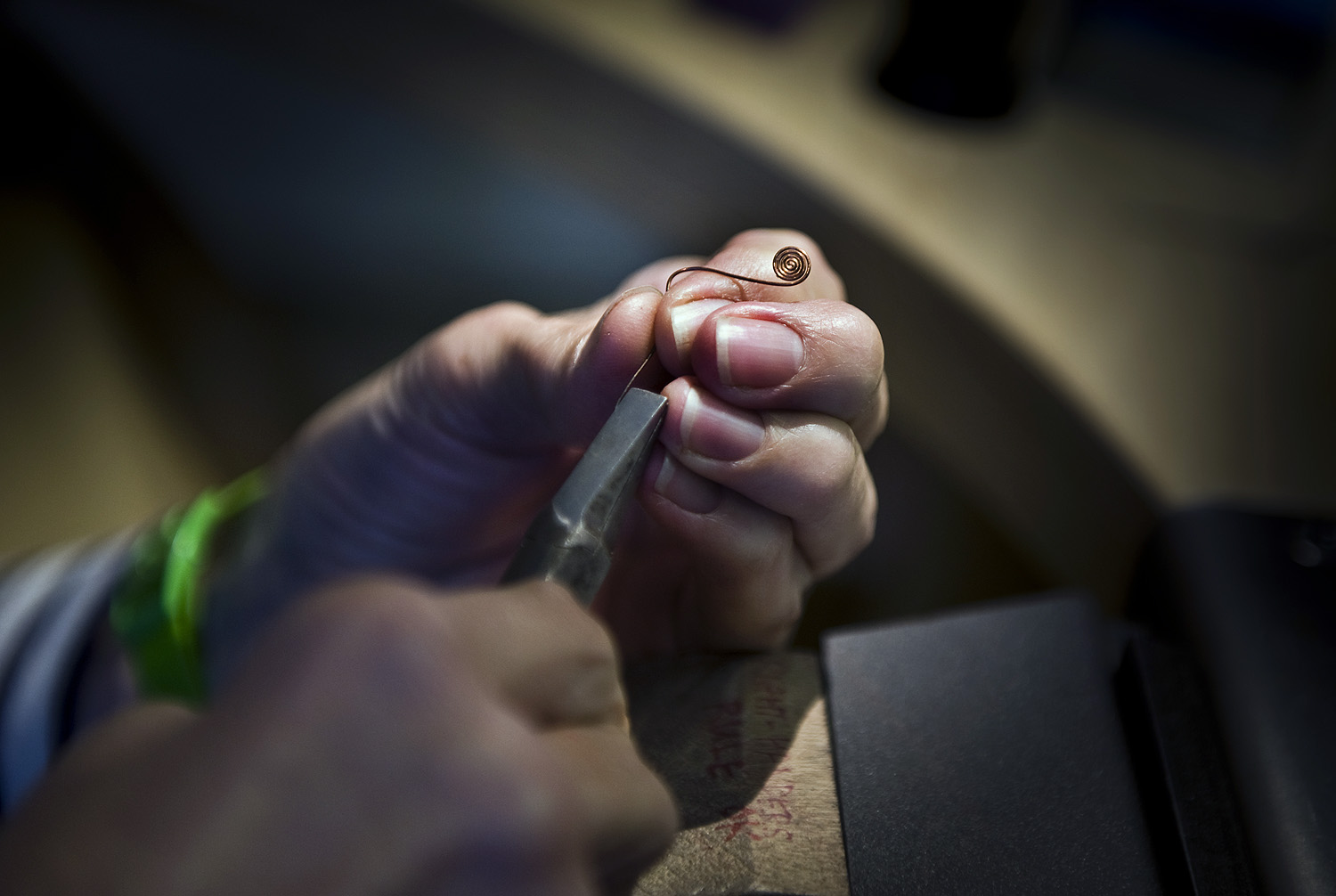 jane ruljancich at work on one of her jewellery pieces